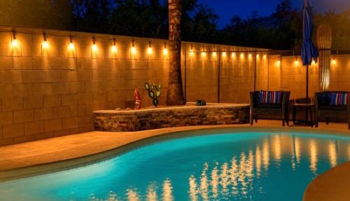Relaxing Summer Nights at Casa Buena Vida Pool Fire Pit Table Games