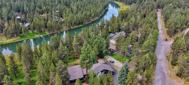 Riverfront home sleeps 14 with Dock and Game Room.