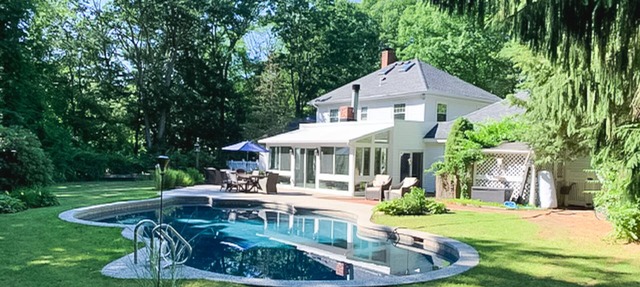 Seacoast home with private pool, sunroom, patio, grill, firepit, & fireplace