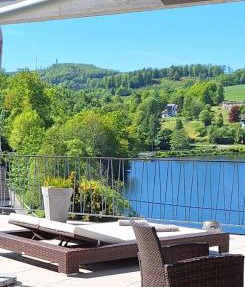 Seeblick-Ferienwohnung "Agger-Blick 2" mit traumhafter Terrasse, kostenlosen E-Bikes, Sauna & Kajak