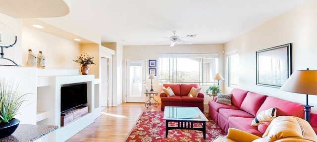 Serene mountain view condo with balcony, patio, washer/dryer, & board games