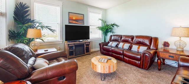 Serene waterfront condo with pool, hot tub, game room & washer/dryer
