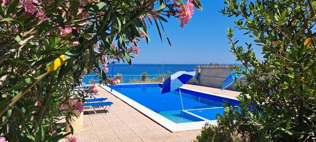 Simple seafront flat with pool in Ilia, Peloponnese, Greece