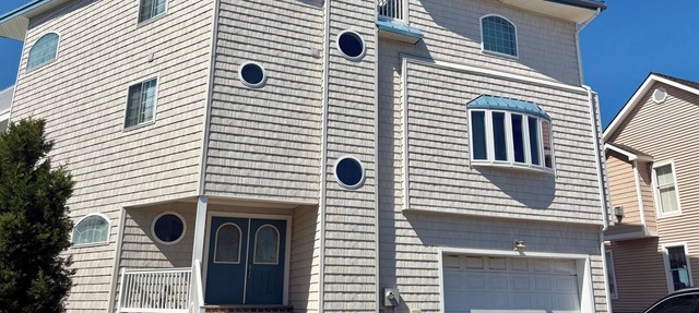 Spacious bayfront home in Avalon Manor with spectacular 360 degree views of the wetlands and inlet from the roof top deck.