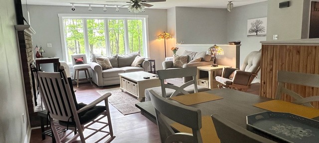 Spacious five-bedroom home off Back Lake with direct trail access on Spooner Rd
