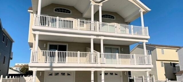 Spacious front decks boast both ocean and bay views