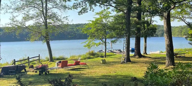 Spring fed Lake front home floating dock and boats