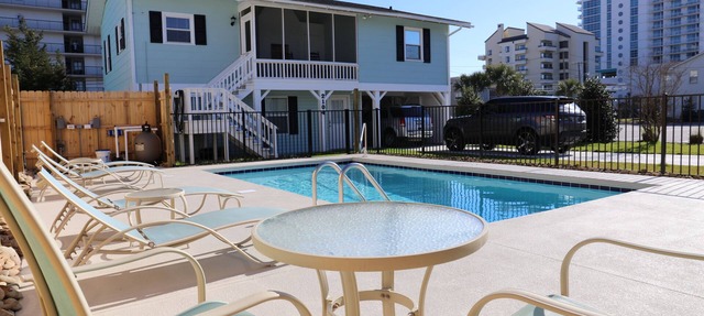 Steps to the beach. Pet friendly Beach House w/pool! 4 Bedrooms sleeps 12!