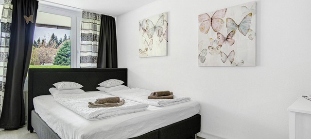 Studio Apartment "Schmetterling" near Slopes with Shared Pool & Wi-Fi