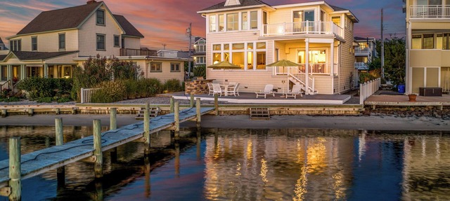 Stunning bayfront w/private bay beach and dock