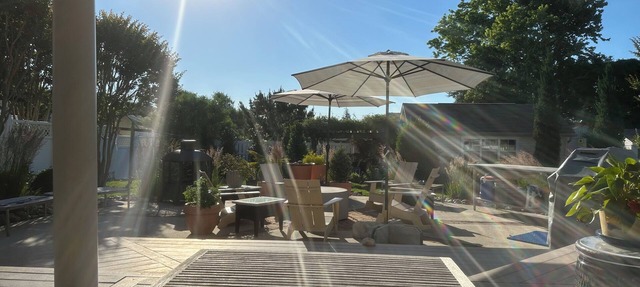 Sunset View Beach Bungalow - Pets Allowed. Amazing covered deck and yard.