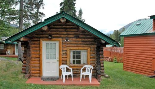 Traditional Log Cabin with Large Windows on the Kenai Peninsula, Alaska