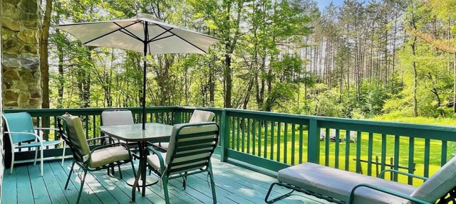 Tranquil cottage retreat with screened porch, campfire, and cozy living spaces. Perfectly located near Cooperstown and Oneonta. Sleeps 6.