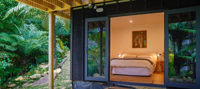 Tranquil space off nestled among native bush off Queen Charlotte Track