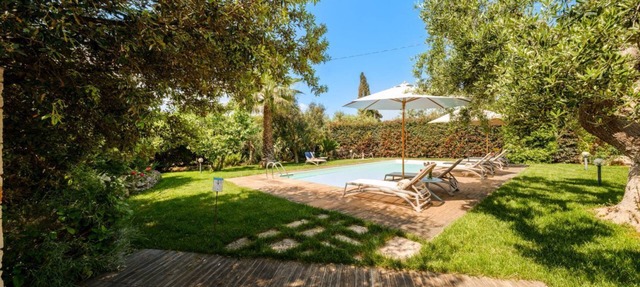 Typical stone structure with private swimming pool a few steps from the town