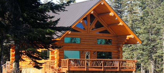 Unique Alaskan log home in trees & wild flowers on 14-acre private homestead.