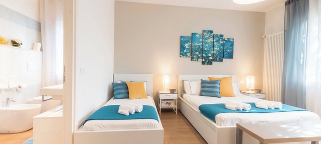 VILLA DUE GIARDINI Appartamento tre camere da letto ciascuna con bagno privato
