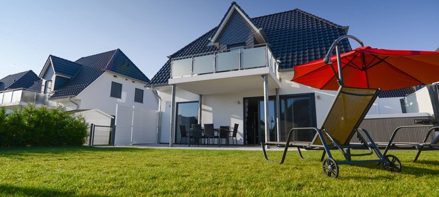 Villa Fleesenstrand am See | with outdoor whirlpool | Sky TV | Fireplace | sauna