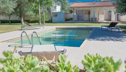 Villa IslaMaris con Piscina nel Boomerang Village a Torre Colimena