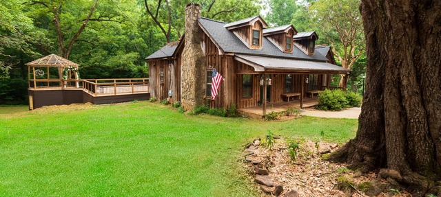 Vintage charm meets modern comfort in this historic 1850s cabin at Lake Hartwell