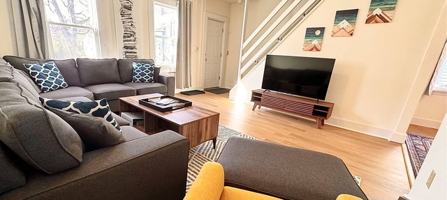 Walk to campus; open concept kitchen/living;nature trail at end of this quiet st