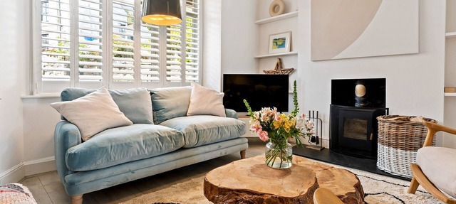 Waterside cottage with sea views & log burner