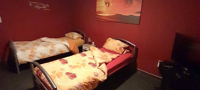 Worker's quarters with 3 single beds, a kitchen, and a bathroom; Wi-Fi