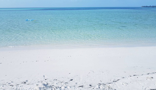 100ft from the most beautiful beach and crystal clear water, with free golf cart