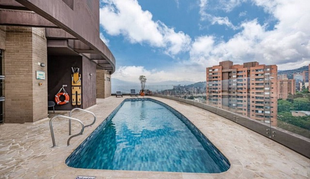 12th Floor 2BR Apt with City View & rooftop Pool
