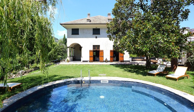 16th-century hunting lodge with pool and garden within a historic private villa