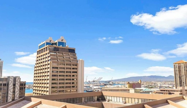 16th Fl Executive Center 1BR Condo | Parking | Pool | City View