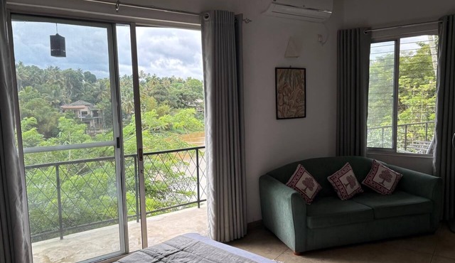 2-bedroom riverside first floor apartment in beautiful Kandy with AC, WiFi