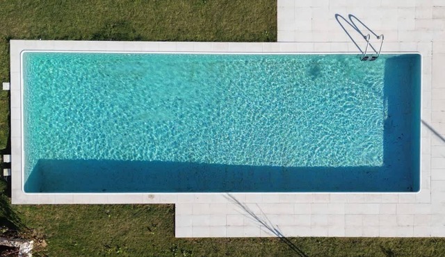 2 Poolside 2BR with Balcony in Gaia by HostWise