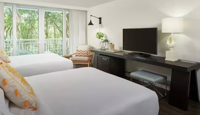 2 Spacious Resort Room Featuring 2 Queens and Lush