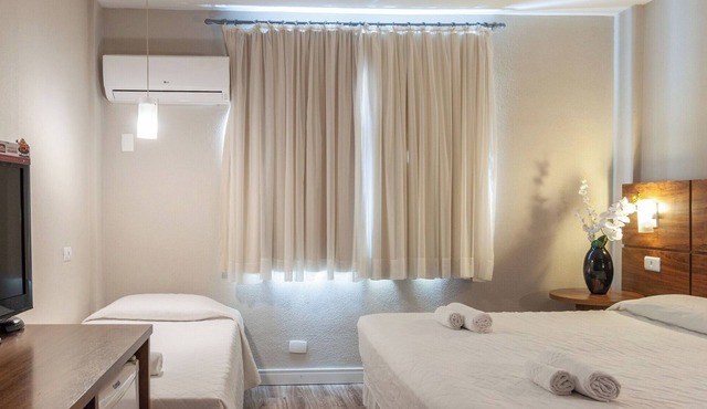 2 Stylish Executive Triple Room Near Top Parks, Dining, and Shopping in Curitiba