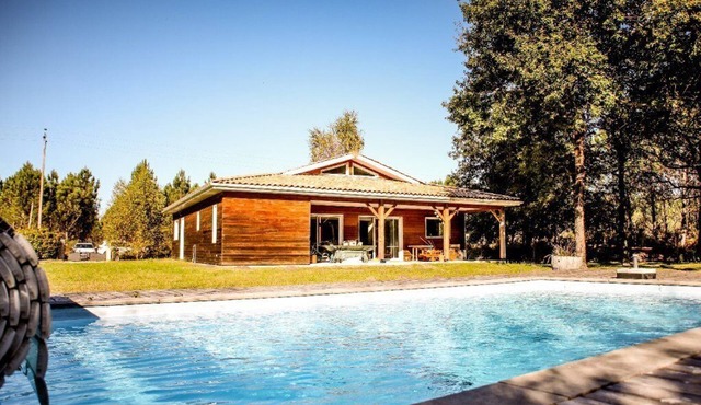 214 - Beautiful villa with a swimming pool in the heart of the wood.