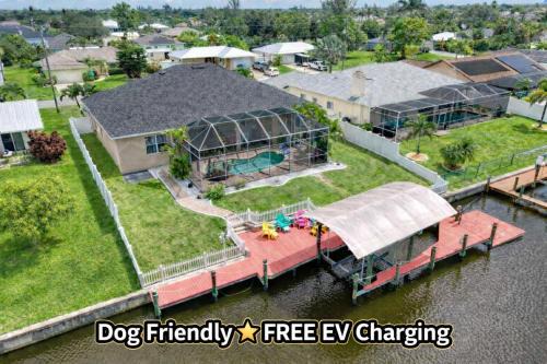 2790 Sq Ft, Open Concept, One Story Gulf Access Home with Private Dock and 20,000 lb Boat Lift, 4 complimentary watercraft, Fenced Yard, Heated Pool, Children's and Adult Bikes, Fishing and Beach Gear, Family Ready and Dog Friendly!