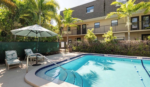 2BR Stylish Retreat with BBQ, Pool & Beach