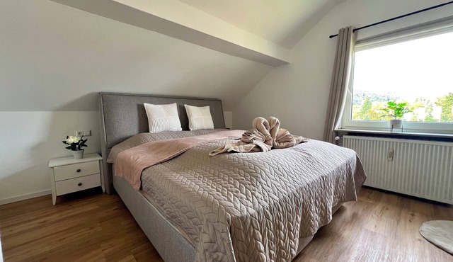 2nd room attic apartment with castle view & king-size bed