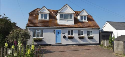 3-Bedroom Family Home. Just 5 Mins From The Beach!