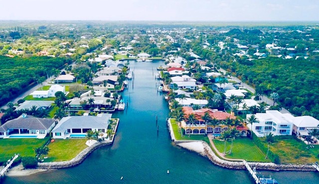 3b -3 ba furnished with boat lift and ocean access and no low bridges