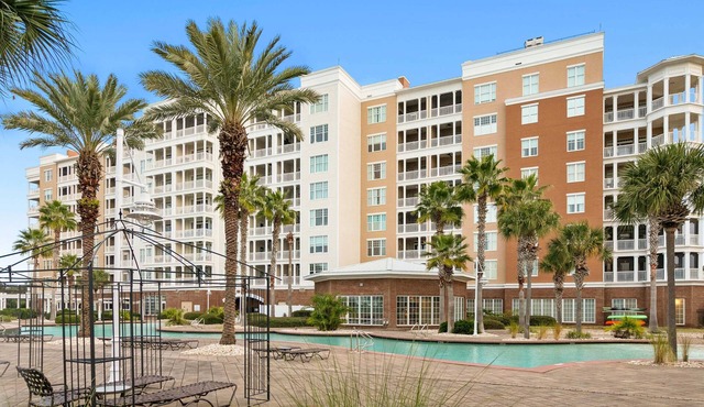 3rd-floor beach & pool-view condo with outdoor pool, hot tub, grills, balcony