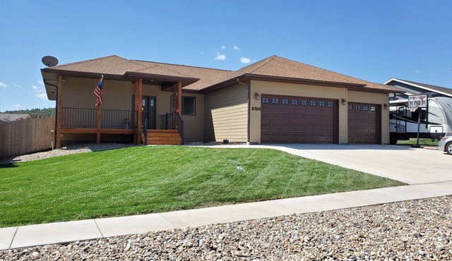 5 bedrooms, covered deck, whirlpool tub and full access to the Black Hills