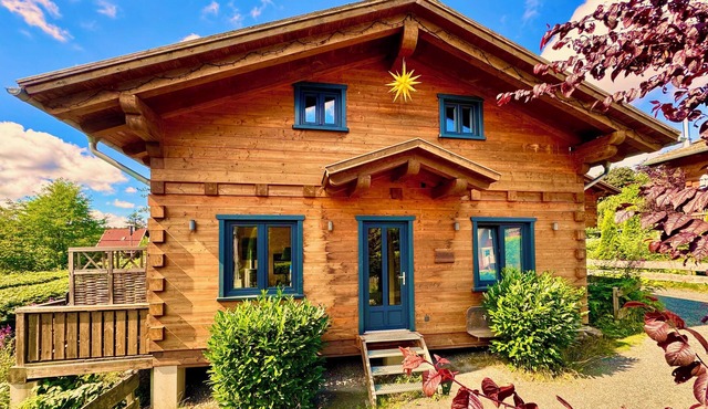 5 * log cabins with sauna, fireplace, terrace, barbecue etc. in alpine chalet style