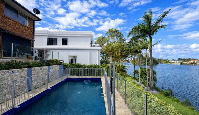 5BR Waterfront Haven | Deck Garden & Sunlit Bedrooms