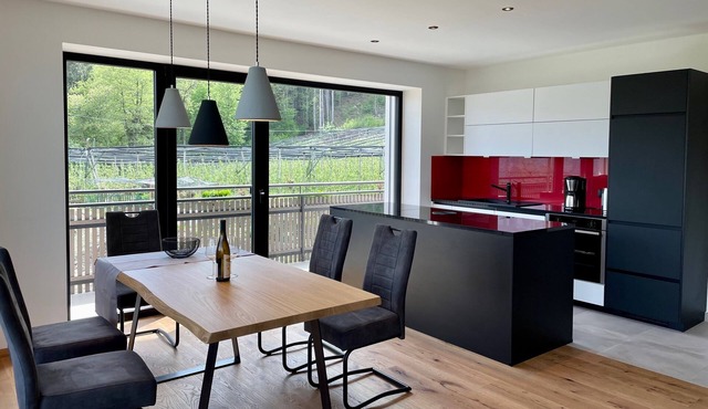 90 m² new vacation apartment with mountain view, sunny balcony and WLAN.