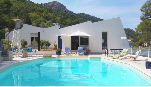 A BALCONY OVERLOOKING SAINTE VICTOIRE