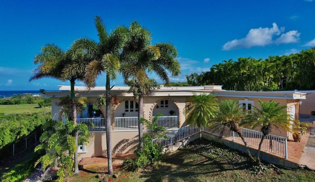 A Beautiful And Unique Two Story Vacation Home On One Acre Of Land In Camuy.