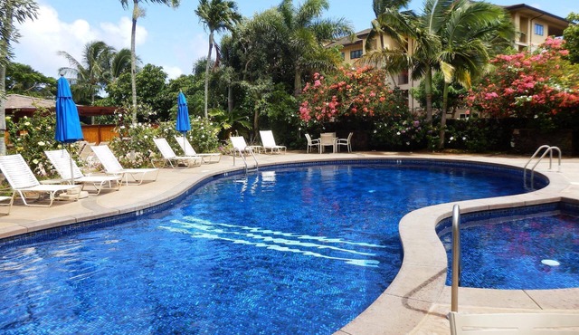 A/C throughout spacious clean comfortable main floor condo with lush garden view