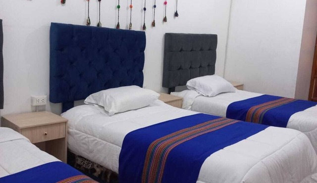 A centrally located 8-bedroom apartment for groups, very close to the main square.